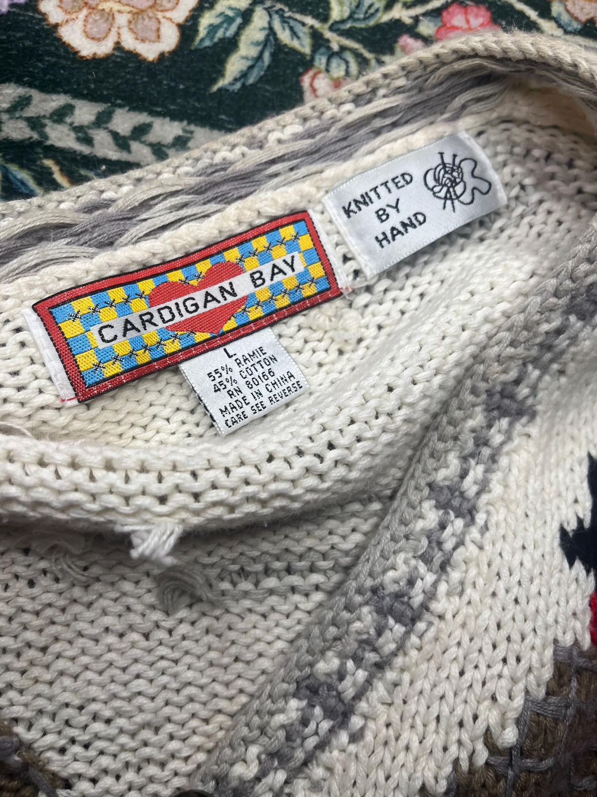 Women’s knitted sweater with winter theme L