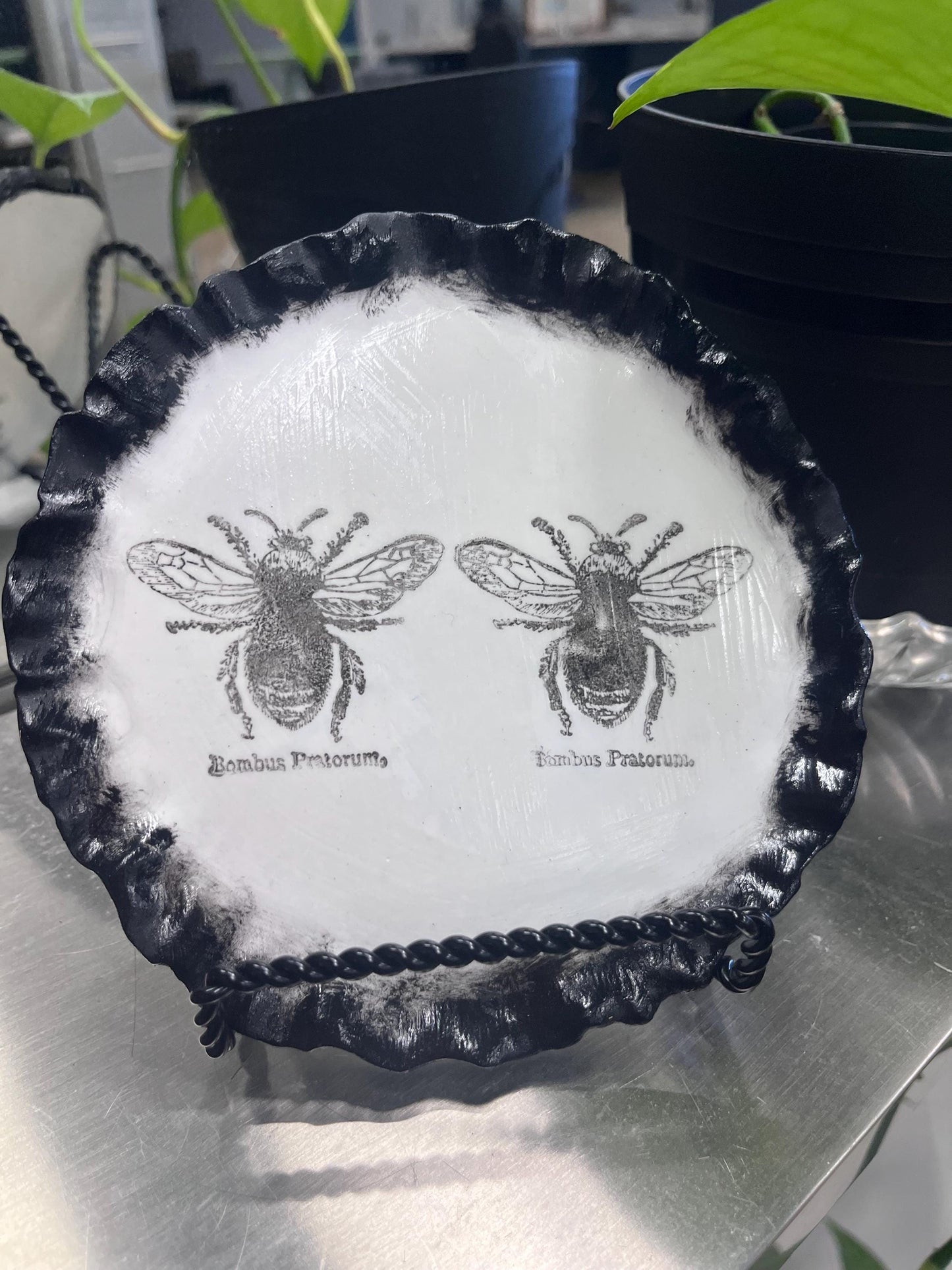Bee stamped  ceramic plate in black & white