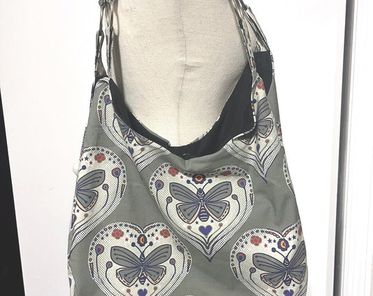Moth print hobo bag