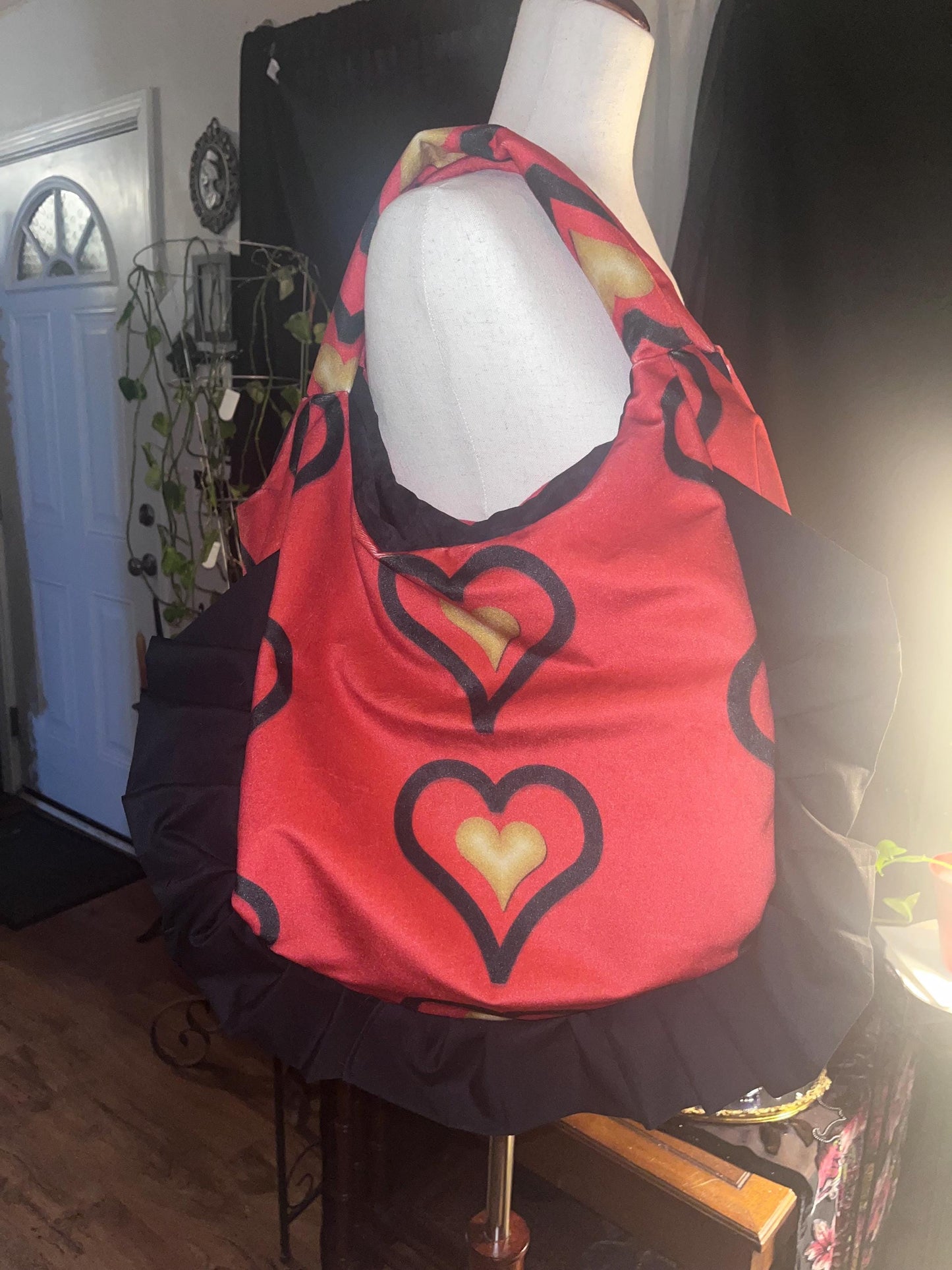 Red velvet w/gold heart hobo bag with ruffles.